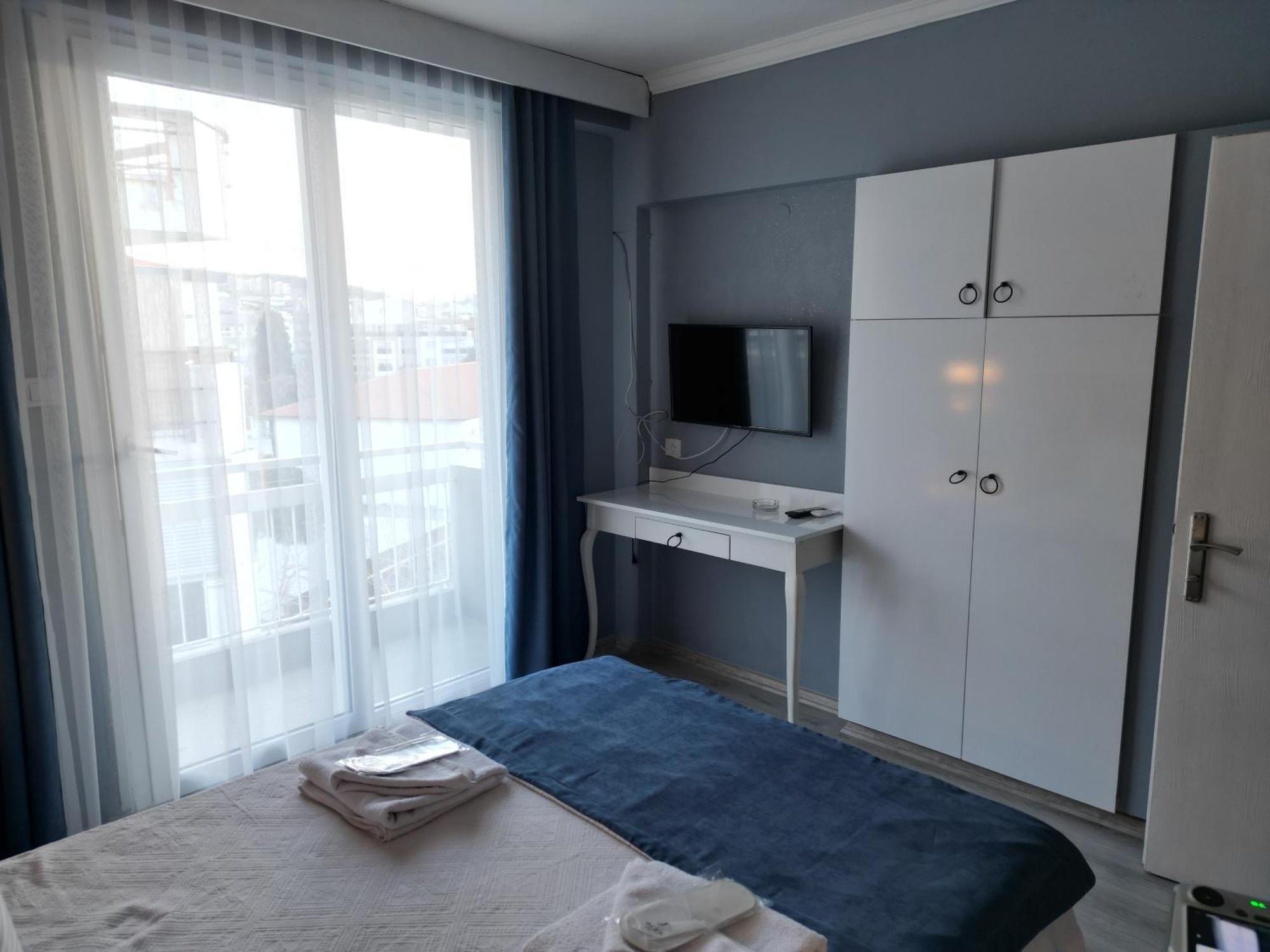 Akman City Hotel Кушадасы Экстерьер фото