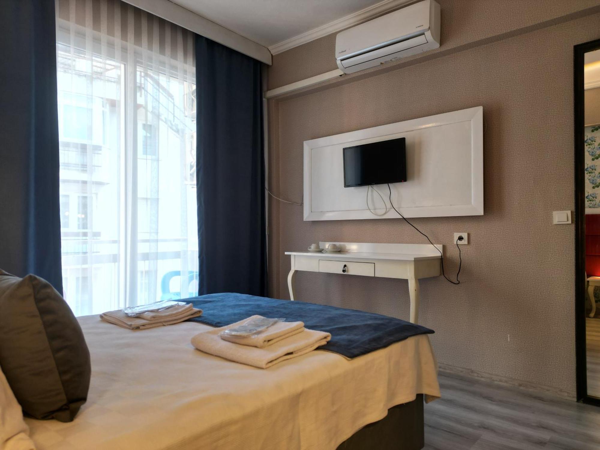 Akman City Hotel Кушадасы Экстерьер фото