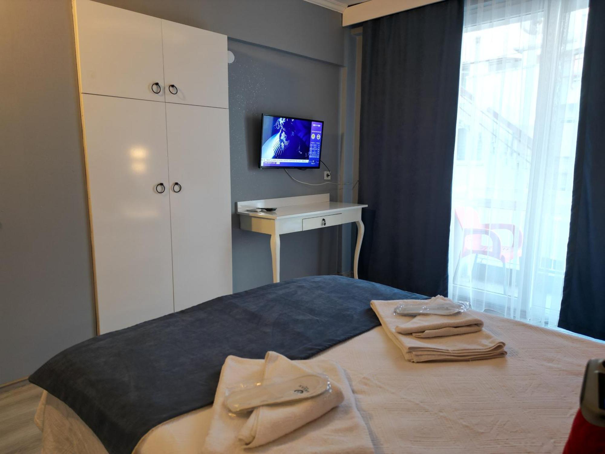 Akman City Hotel Кушадасы Экстерьер фото